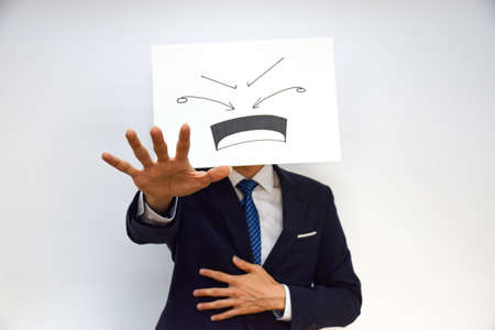 Facial expression of a person made of paperの写真素材