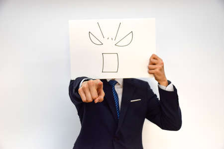 Facial expression of a person made of paperの写真素材