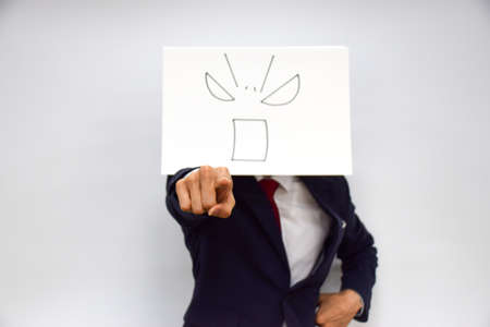 Facial expression of a person made of paperの写真素材