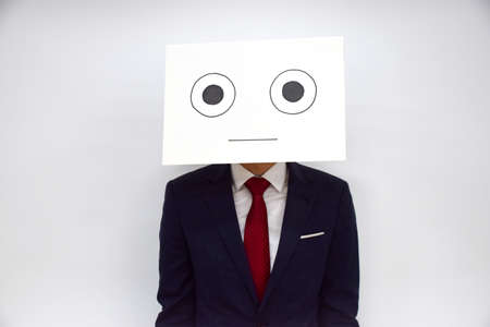 Facial expression of a person made of paperの写真素材