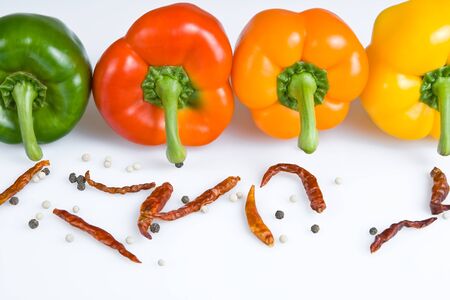 Differently colored peppers with chilliの写真素材