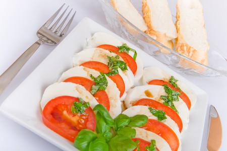 Mozarella with tomato and basilの写真素材