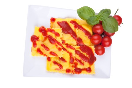 Ravioli with tomato sauce and basilの写真素材