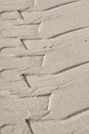 Skidmark of a vehicle tyre on the beachの写真素材