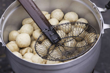 Thai pisces dumplings in the pot with creator; Thai cookingの写真素材