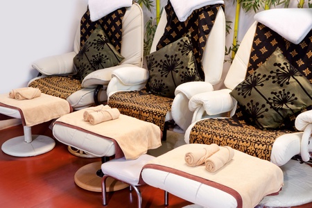 Massage chairs with pillows and towelsの写真素材