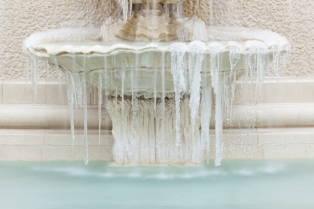 Frozen ice on fountainの写真素材