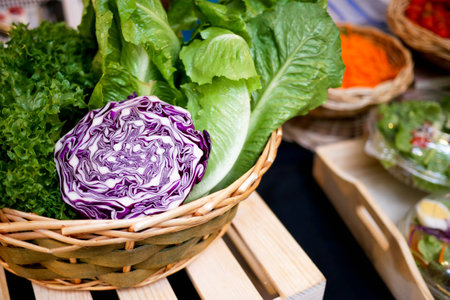 Vegetable basket on front of salad shopの写真素材