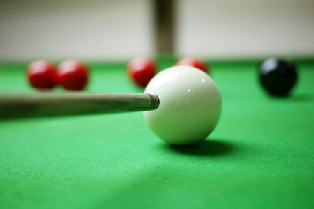 Snooker player aiming on the balck ballの写真素材