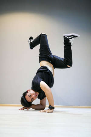 Asian Breakdancer perfrom Bboy freeze moveの写真素材