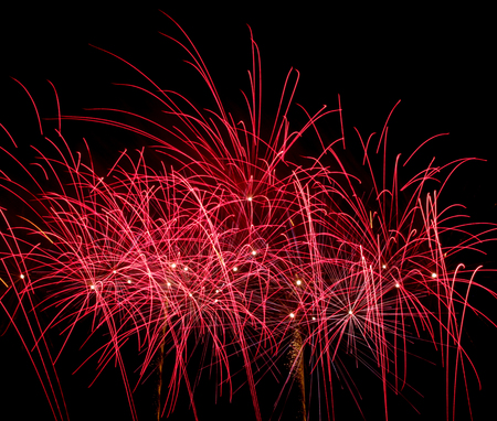 Colorful fireworks on black background at international competition in Montrealの写真素材