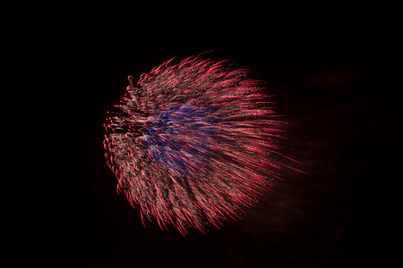 Colorful fireworks on black background at international competition in Montrealの写真素材