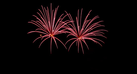 Colorful fireworks on black background at international competition in Montrealの写真素材
