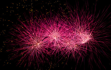 Colorful fireworks on black background at international competition in Montrealの写真素材