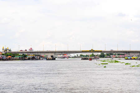 This bridge crossing the river.bridge name is Rama 4 in Thailand.の写真素材