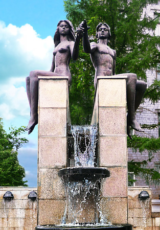 Picturesque fountain in the city Park. Adam and eve, holding the Apple. Russiaの写真素材