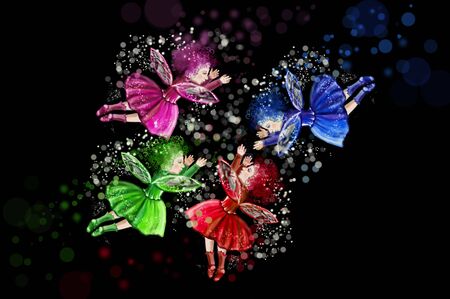 Four Christmas fairies positioned in a circle on a black background. Red, green, blue and purple fairy. Fairy tale charactersの写真素材