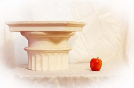 Doric capital with the Apple