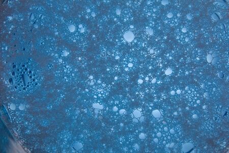Bubbles in a blue liquidの写真素材