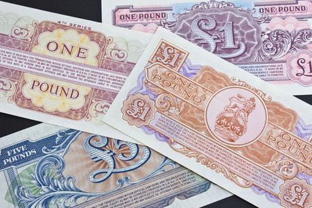The reverse side of bank notes used by the British Army overseas issued in 1940s and 50sの写真素材