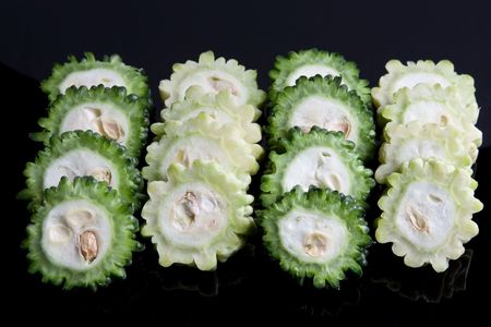 Slices of Karela, also known as the bitter gourd or bitter melonの写真素材
