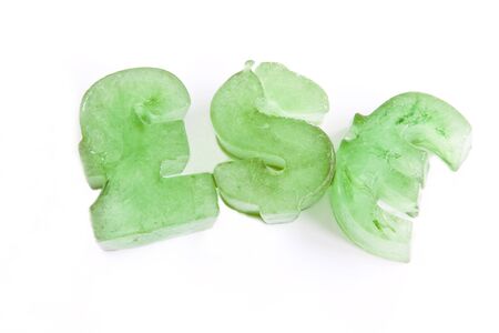 Frozen pound, dollar & euro currency symbols depicting economic meltdown, frozen assetsの写真素材