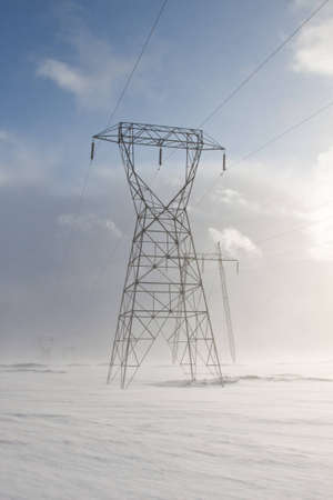 Electric Pylons on Hellisheidi Moor, between Reykjavik & Selfoss, during a break in a blizzardの写真素材