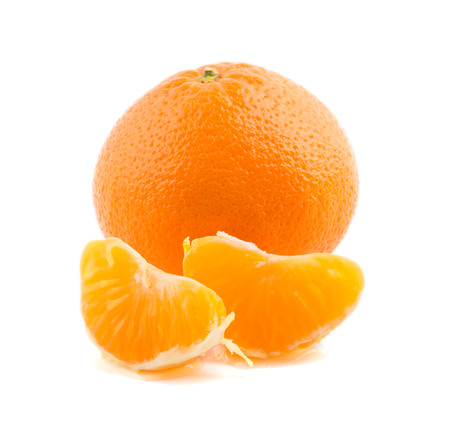 Juicy tangerine with slices on white backgroundの写真素材