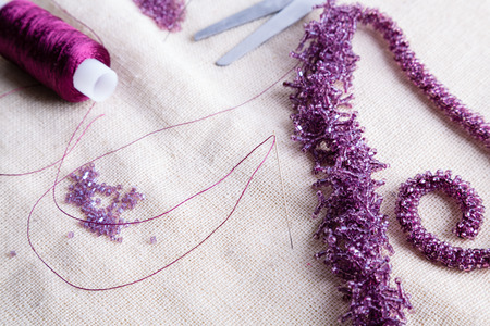 Beads on a background of old cloth 