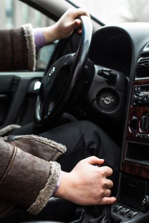 A man sitting in a car