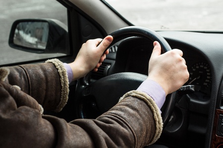 A man sitting in a car
