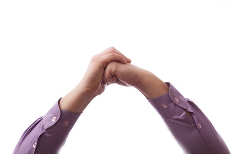 Hands clasped together for a prayerの写真素材