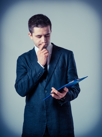 Business man with a clipboardの写真素材