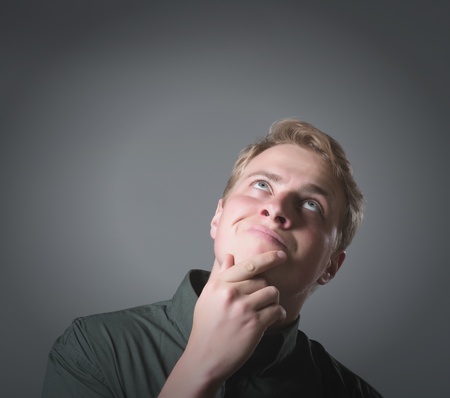 handsome young thoughtful businessman