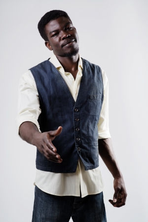 African American business man with an open hand ready to seal a dealの写真素材