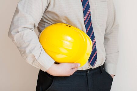 worker with helmet in handの写真素材