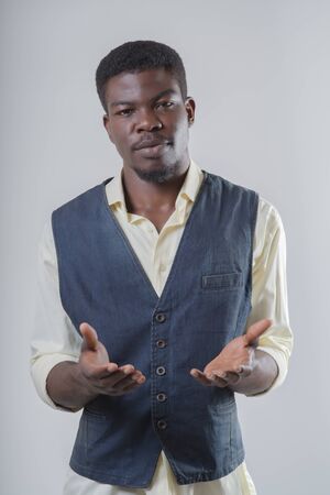 African-American holds open palmの写真素材