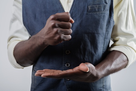 African-American bet a fist into his palm