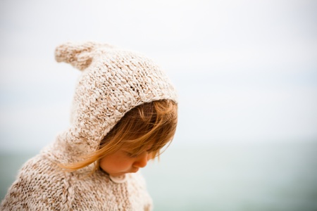 little girl on the beachの写真素材