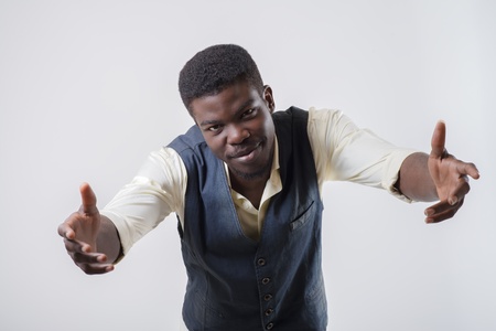 African-American young man holding somethingの写真素材