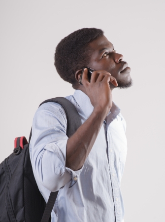 African-American man talking smartphoneの写真素材