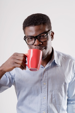 African-American man holding a cupの写真素材