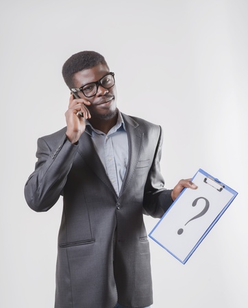 African-American businessman talking smartphoneの写真素材