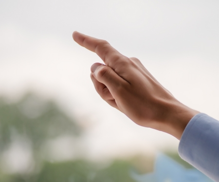 index finger shows the windowの写真素材
