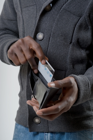 African-American man holding a wallet