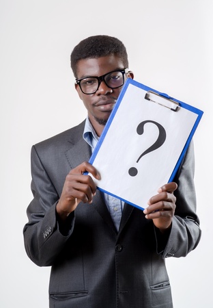 African-American businessman holding a question markの写真素材