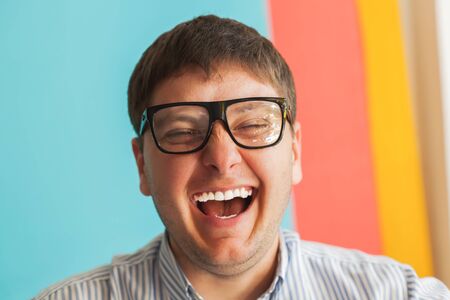 smiling man with glassesの写真素材