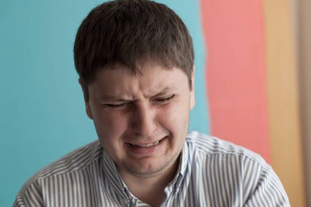 Upset man with glassesの写真素材