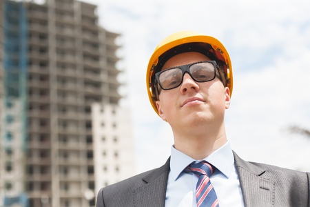 successful engineer with glasses and helmetの写真素材