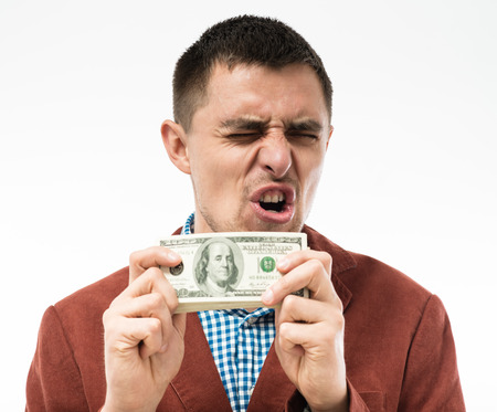 man holding moneyの写真素材